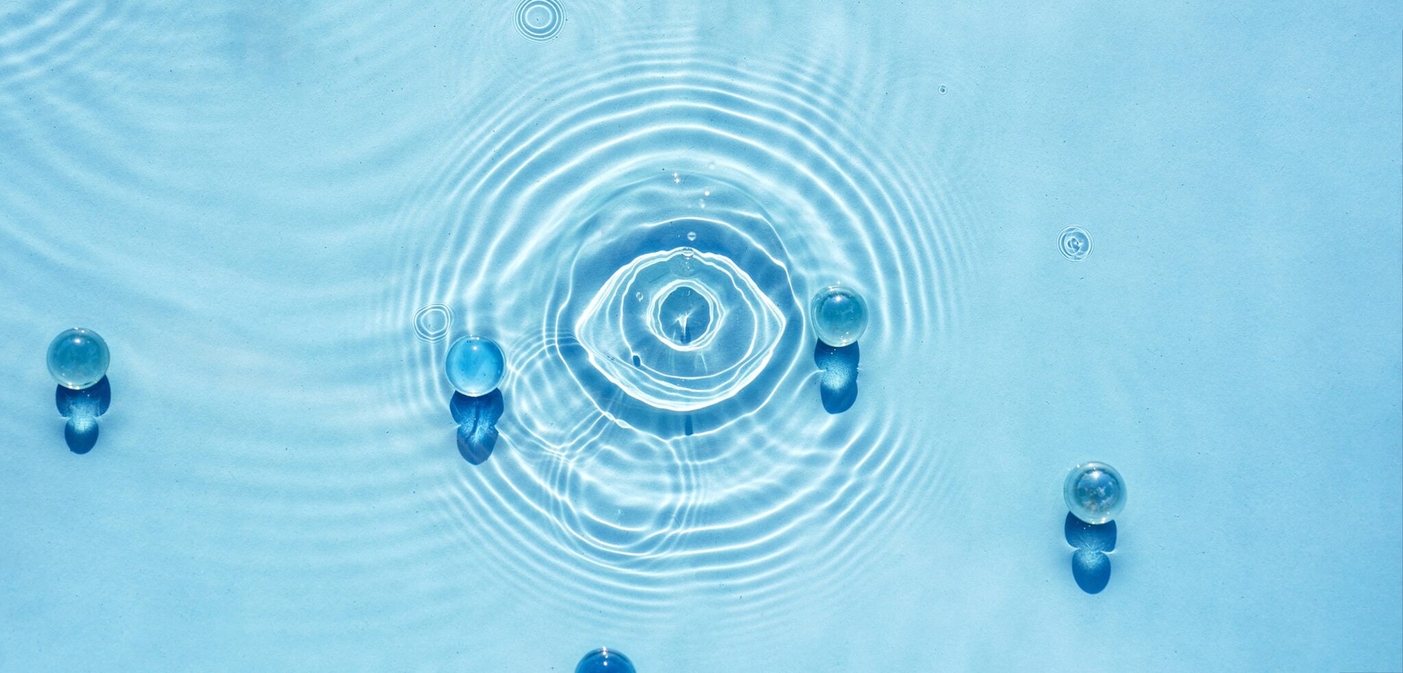 Abstract transparent water background with ripples